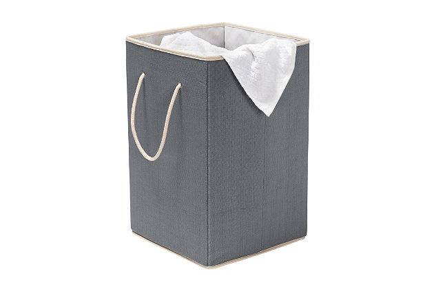 No more clothes piles to look at with this resin clothes hamper. The square shape and stylish exterior fit right into your space décor. It has a breathable liner that keeps away dirty clothes odor and you can grab it by the handles to take it easily back and forth to your laundry area.  Let’s face it, laundry day is laundry day, but at least it’ll look a little better with this clothes hamper around.Keep dirty laundry in order with this stylish clothes hamper | Durable resin exterior with breathable liner that keeps odor out of hamper | Handles provide mobility | Folds flat for easy storage