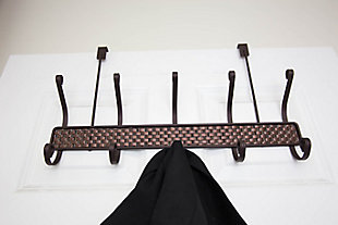 Pair your ensemble with a touch of modern elegance by using this Bronze Over-the-Door Hanging Rack, featuring a unique woven design. Made of durable steel, it features 5 curved hooks atop a rich, woven frame to beautifully display your snazzy collection of hats, scarves, coats, shirts or conveniently store your pup's leash. The 5 hook hanging rack easily fits most interior doors thanks to its sturdy metal bracket and with a ravishing bronze finish, it easily coordinates with a variety of decor.Made of bronze-coated steel | Attaches to an interior door to create instant storage space in your bedroom or bathroom | Easy to assemble with no mounting hardware required | 0