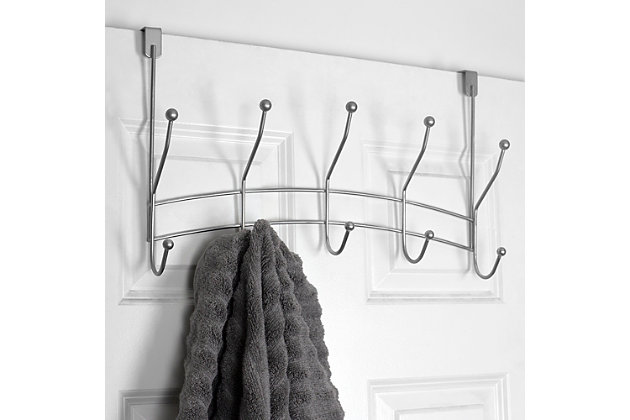 The perfect addition to any room, the Shelby 5 Hook Over-the-Door Hanging Rack is the answer to all you organizational needs! With zero tools required to install simply slide it over an interior door to get instant storage space You can use each of the five hooks to stage out an entire outfit. Place it in the entryway to use as a drop zone for your guest's coats. Hang it over the bathroom door to keep your bath towels handy. Fits most standard interior doors.Attaches to an interior door to maximize space | Soft sculpted hooks are designed to gently grasp your clothing without snagging | Great for any room in the house | Made of rust-proof steel