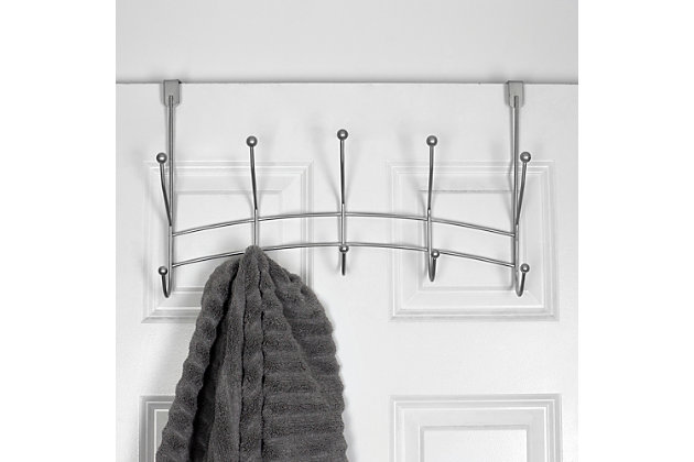 The perfect addition to any room, the Shelby 5 Hook Over-the-Door Hanging Rack is the answer to all you organizational needs! With zero tools required to install simply slide it over an interior door to get instant storage space You can use each of the five hooks to stage out an entire outfit. Place it in the entryway to use as a drop zone for your guest's coats. Hang it over the bathroom door to keep your bath towels handy. Fits most standard interior doors.Attaches to an interior door to maximize space | Soft sculpted hooks are designed to gently grasp your clothing without snagging | Great for any room in the house | Made of rust-proof steel