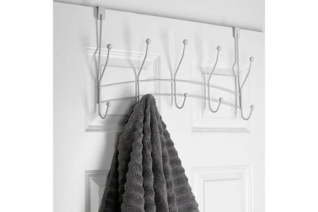 The perfect addition to any room, the Shelby 5 Hook Over-the-Door Hanging Rack is the answer to all you organizational needs! With zero tools required to install simply slide it over an interior door to get instant storage space  You can use each of the five hooks to stage out an entire outfit. Place it in the entryway to  use  as a drop zone for your guest's coats.  Hang it over the bathroom door to keep your bath towels handy.   Fits most standard interior doors.Attaches to an interior door to maximize space | Soft sculpted hooks are designed to gently grasp your clothing without snagging | Great for any room in the house | Made of rust-proof steel