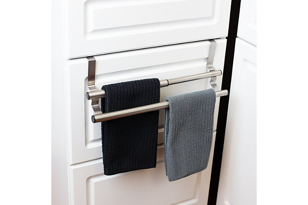 Great if you’re short on storage space, this functional and versatile Over-the-Cabinet Door 2 Tier Steel Towel Storage Rack hangs over the outside of your cabinet doors for convenient, stylish storage. Measuring approximately 10 inches long by 4.7 inches wide, this durable towel rack can be adjusted to size of the towel without interfering with the hardware of your cabinet doors while also allowing cabinets to close flush. When fully extended the towel bar measures 15.75 inches, making it great for lining up small garments to hang dry or for storing a large beach towel.Attaches to outside cabinet door keeping towels close at hand and off the counters and vanities | Expandable to fit your storage space needs | Made of premium quality steel | 0