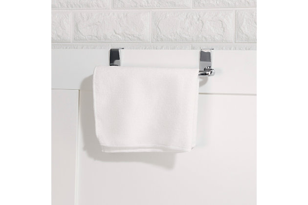 Free-standing towel holders take up too much room. Wall-mounted towel bars can leave unsightly holes in the walls. When you're short on countertop and table space, and don't want to drill into your walls, simply attach this Chrome Plated Steel 9" Over-the-Cabinet Towel Bar over your interior cabinet door to keep your kitchen or bath towel handy. The stainless steel finish offers both style and durability while coordinating seamlessly with a variety of kitchen and bath decor. Because of it's sleek profile, this Over-the-Door towel holder fits perfectly in rooms around the house with limited space. Great for storing kitchen towels or small linen.Made of chrome-plated steel | Attaches to an interior cabinet door to create instant, discreet storage space for bath and kitchen towels, wash cloths, | No installation required | Contemporary chrome finish to complement any type of decor