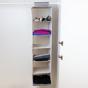 Taking full advantage of vertical space, this hanging organizer is a perfect addition to a small closet. Use each shelf to categorize your everyday essentials or coordinate different outfits. Sturdy cardboard inserts across the bottom of each cubby help to even the load, further maintaining its shape and structure. The breathable, non-woven fabric is gentle on clothes and fragile items, while the jute-like design brings a touch of luxury. The organizer is slim in size and collapses into a flat square to conserve space while storing.Made of non-woven fabric and cardboard | Beige, cream and brown | 6 shelves | Flexible fabric shelving for any space | Open cubby-style shelves for easy access to items | Folds flat for space-saving storage