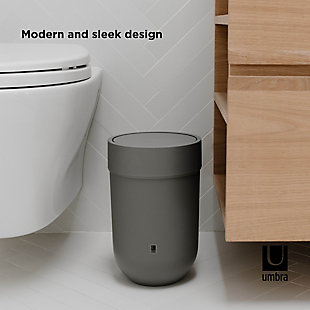Plainly stated, garbage isn’t the most appealing accumulation of objects in the home. With this attractive waste can, you’ll be able to keep your trash looking rather inconspicuous.  Introducing TOUCH Waste Can by Umbra.  For a modern alternative to the traditional waste paper basket, consider TOUCH Waste Can.  TOUCH’s soft, matte finish gives it a modern and luxurious feel, while its flat swing lid will keep garbage concealed. Sleek in size, TOUCH measures 7½  x 12  inches (19 x 30 cm), and holds 1.6 gallons, so you won’t have to take out the trash too often. TOUCH is part of a wider collection of bath products, all designed by Alan Wisniewski, its molded material makes it low-risk for breakage.MODERN AND SLEEK: A sleek trash can that will look great in multiple spaces, Touch is a versatile and modern addition to any space | SWING-TOP LID: Touch has a swing lid that keeps garbage hidden away, and is easy to remove, smoothly lifting off when required | SOFT-TOUCH FINISH: Drawing on the luxurious look and feel of matte finishes, this trash can will make a sleek addition to any room you put it in. It features a soft-touch finish, curved lines, and a flat swing lid. | COMPACT: Touch is large enough that you won’t have to frequently empty it, with a capacity of 1.6 gallons (6L), but sleek enough to suit many spaces, Touch measures 7½ x 12 inches (19 x 30 cm) | 5-YEAR MANUFACTURER WARRANTY: Shop with confidence knowing that all Umbra products are backed by a 5-Year Manufacturer Warranty