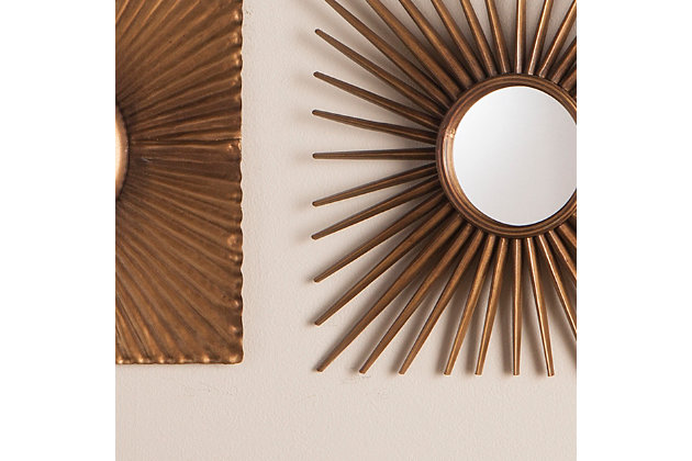 Three's a party with this decorative mirror set. Three individual wall sculptures dance a burnished goldtone performance, each showcasing a central mirror cut into mid-century modern squares. Cluster together for a three-act scene, or spread apart for glam touches throughout the home. Suspend straight on or diagonally for a custom small-space wallscape over the sofa, or in the hall or kitchen. Distressed and crimped finishes will vary from piece to piece, crafting a one-of-a-kind feel.Set of 3 | Made of iron sheet, 3-mm mirror and engineered wood | Antiqued goldtone finish | Hang straight or diagonally | Ready to hang | No assembly required