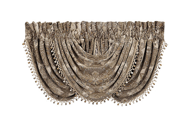 Evoking a mood of bygone elegance, the J. Queen New York Bradshaw Window Waterfall Valance brings the past beautifully into the present. Sure to add a decorator touch to your home, this damask patterned window valance with waterfall draping is crafted with care and trimmed with tri-color tassel/ball fringe.Made of polyester | Trimmed with tri-color tassel/ball fringe | Matching curtain panels available, sold separately | Dry clean only | Imported