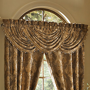 Evoking a mood of bygone elegance, the J. Queen New York Bradshaw Window Waterfall Valance brings the past beautifully into the present. Sure to add a decorator touch to your home, this damask patterned window valance with waterfall draping is crafted with care and trimmed with tri-color tassel/ball fringe.Made of polyester | Trimmed with tri-color tassel/ball fringe | Matching curtain panels available, sold separately | Dry clean only | Imported