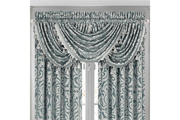 Evoking a mood of bygone elegance, the J. Queen New York Sicily - Teal Window Waterfall Valance brings the past beautifully into the present. Sure to add a decorator touch to your home, this damask patterned window valance with waterfall draping is crafted with care and trimmed with crystal beaded tassels.Made of polyester | Trimmed with crystal beaded tassels | Matching curtain panels available, sold separately | Dry clean only | Imported