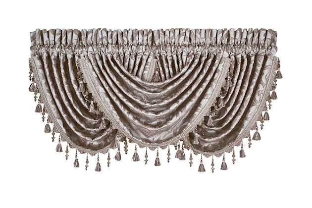 Evoking a mood of bygone elegance, the J. Queen New York Sicily - Pearl Window Waterfall Valance brings the past beautifully into the present. Sure to add a decorator touch to your home, this damask patterned window valance with waterfall draping is crafted with care and trimmed with crystal beaded tassels.Made of polyester | Trimmed with crystal beaded tassels | Matching curtain panels available, sold separately | Dry clean only | Imported