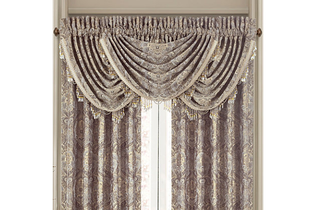Evoking a mood of bygone elegance, the J. Queen New York Provence Window Waterfall Valance brings the past beautifully into the present. Sure to add a decorator touch to your home, this damask patterned window valance with waterfall draping is crafted with care and trimmed with crystal beaded tassels.Made of polyester | Trimmed with crystal beaded tassels | Matching curtain panels available, sold separately | Dry clean only | Imported
