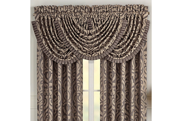 Evoking a mood of bygone elegance, the J. Queen New York Astoria - Mink Window Waterfall Valance brings the past beautifully into the present. Sure to add a decorator touch to your home, this damask patterned window valance with waterfall draping is crafted with care for the upscale aesthetic you desire. Made of polyester | Matching curtain panels available, sold separately | Dry clean only | Imported