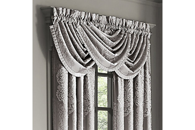 Evoking a mood of bygone elegance, the J. Queen New York La Scala - Silver Window Waterfall Valance brings the past beautifully into the present. Sure to add a decorator touch to your home, this damask patterned window valance with waterfall draping is crafted with care for the upscale aesthetic you desire. Made of polyester | Pocket rod design (3" header and 3" rod pocket) | Finished with pleated solid satin | Matching curtain panels available, sold separately | Dry clean only | Imported