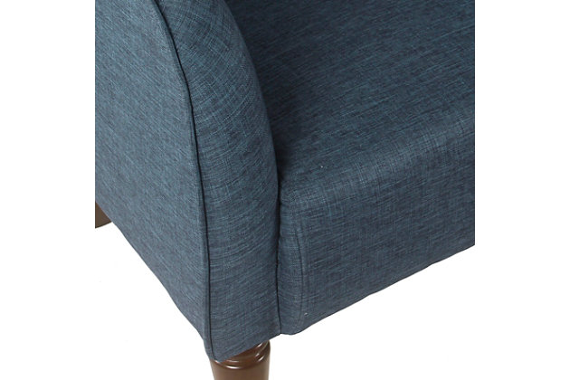 Our traditional barrel chair will add fun and fashion to your living room, bedroom or entryway. With a textured navy blue woven fabric and contrasting espresso finished, our traditional barrel chair offers a sophisticated look to any home.  Pair two together for a bold seating solution. Easy to assemble and maintain.Medium firm cushion for comfort and durability | Wood legs in dark walnut finish | Navy blue woven fabric | 19.5" seat height | Dimensions: 30.3 inches high x 29 inches wide by 30 inches deep | Material: Wood, Polyester | Capacity: Supports up to 250 pounds | Care and Cleaning: Spot Clean Only | Weight: 27.9 pounds