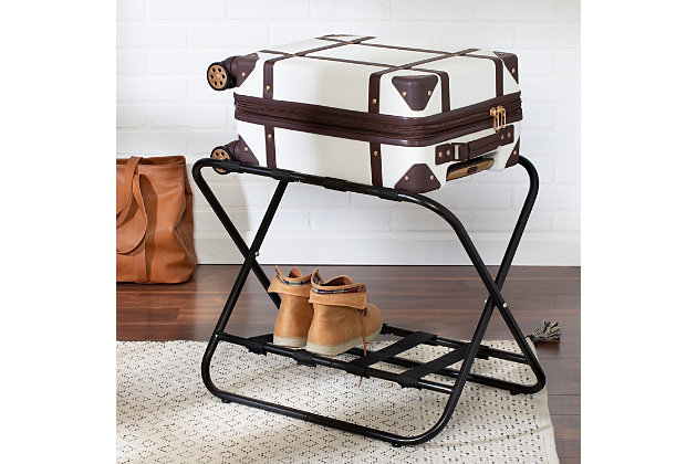 When the guests arrive, you want to provide a comforting space. Pull this collapsible luggage rack out of the closet and set it up for their belongings. It's sturdy x-frame design can hold up to 100-lbs, so it's perfect for everyone except your sister-in-law who has been known to overpack.Welcoming luggage rack for house guests or quick storage | Folds easily - great for under the bed or tucked away in the closet | Steel and sturdy straps hold strong under pressure of suitcase; holds 100lbs | Material: chrome with nylon straps
