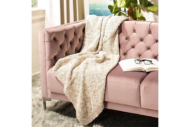 Blending the coziness of your favorite knit sweater with shimmering details, this knit throw elevates any decor with comfort and style. This sumptuous throw is knit using light gray and natural cotton yarns with gold Lurex highlights, adding a touch of sophistication and sheen to the scene.Made of cotton with lurex highlights | Imported | Spot clean or hand wash