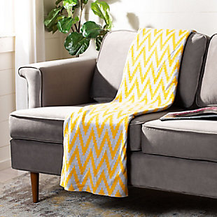 Wrap yourself in sunshine with the soft feel and crisp details of this striking throw. Its flowing chevron pattern accentuates the vivid contrast of gray and brilliant yellow. Rest assured, this throw is crafted with 100% cotton, making it feel every bit as good as it looks.Made of cotton | Imported | Dry clean only
