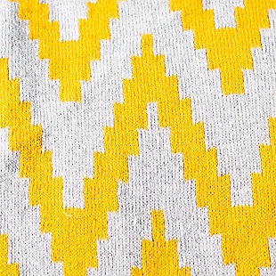 Wrap yourself in sunshine with the soft feel and crisp details of this striking throw. Its flowing chevron pattern accentuates the vivid contrast of gray and brilliant yellow. Rest assured, this throw is crafted with 100% cotton, making it feel every bit as good as it looks.Made of cotton | Imported | Dry clean only