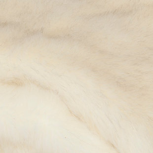 Cocooning becomes a glamorous endeavor with this soft and sensuous faux fur throw in plush white acrylic simulating the color and shading of shadow fox. Drape it across a bed, sofa or chair for warmth, texture and a touch of posh Hollywood luxury.Front made of acrylic; back made of poly suede | Imported | Machine washable