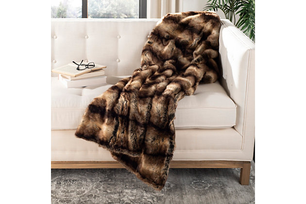 Give in to your animal instinct with this soft, seductive faux fur throw. The subtle splash of alluring color will add an exotic touch to your room decor. Not to mention, you’ll go wild for its luxurious, textural feel.Front made of acrylic; back made of poly suede | Imported | Machine washable