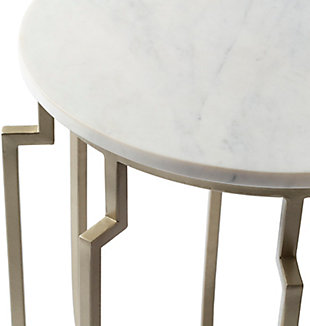 Our haccentrix collection offers an accenturing presentation of the modern form that will competently revitalize your decor space. These pieces are hand crafted, creating a certain atmospheric sophistication that can only be created by a handmade decor piece.  for optimal product care, wipe clean with a dry cloth. Manufacturers 30 day limited warranty.Accent table | Colors: top: white, base: champagne | Materials: top: marble, base: metal | Created in india