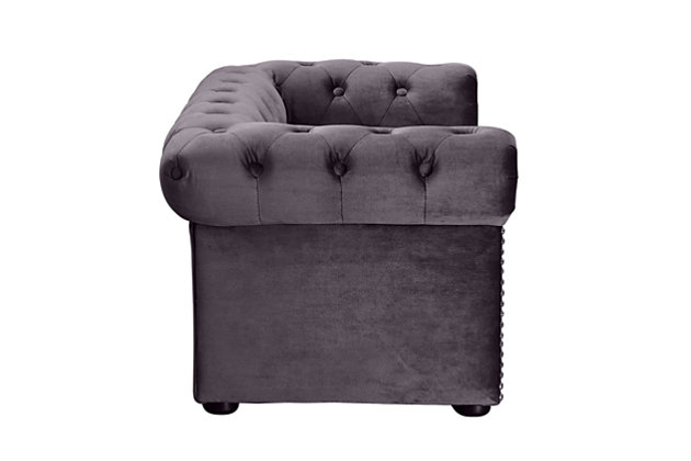 Pamper your pet. This luxurious pet bed adds a touch of style to any room and has a soft shade that is easy on the eyes. Your four-legged family member can sleep comfortably any time of day without being separated from family activity. The luxurious pet sofa features a button-tufted back and hand-applied nailhead trim. Its washable, waterproof velvet is easy to clean and sure to last.Solid wood frame | Upholstered in waterproof velvet fabric | Handmade | Removable, washable cushion | No assembly required | Imported