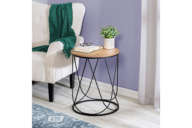 This round side table is the perfect fit to sit beside a sofa or living room chair. Display photographs or accessories on top, or use it as an end table to set a cup of coffee on. The round black frame and natural table top finish makes it the perfect accent piece for your space, no matter the decor.Simple side table acts as perfect end table for your living room | Mdf top with veneer, metal tub base | Dimensions: 19"-dia. X 24"h | Tbl-08801