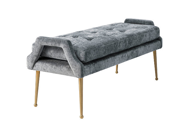 Be a trendsetter with the Eileen Slub Velvet Bench. Featuring elegant gold legs and lush button tufting put this versatile bench in your entryway, living room, or bedroom. It will definitely get noticed. Available in a flirty blush and chic gray.Handmade by skilled furniture craftsmen | Stainless Steel Gold Legs | Sumptuous velvet upholstery | Easy to assemble | Button tufts