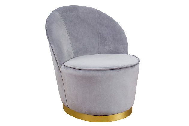 As visually enticing as it is comfortable, this graceful barrel styled chair feels modern and sleek. Lavish velvet upholstery accentuates the elegant curves and craftsmanship which sit on top of a recessed gold base. Available in multiple color options.Part of the TOV Slashed collection | Velvet upholstery is available in multiple color options | Gold colored Pine wood legs | Shown with the Noches headboard and Cavalli side table | Ships assembled