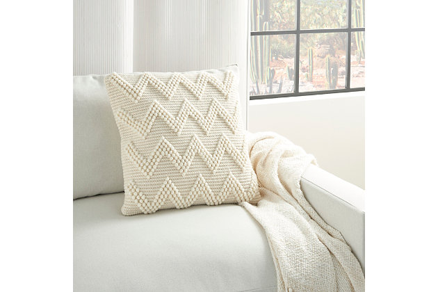 Comfortable and versatile, this handmade wool and cotton throw pillow blends beautifully with just about any color scheme and room decor. The accent pillow's inverted v-shape zigzag pattern adds personality.Cover made of wool/cotton | Polyester fill | Handmade | Zipper closure | Spot clean | Imported