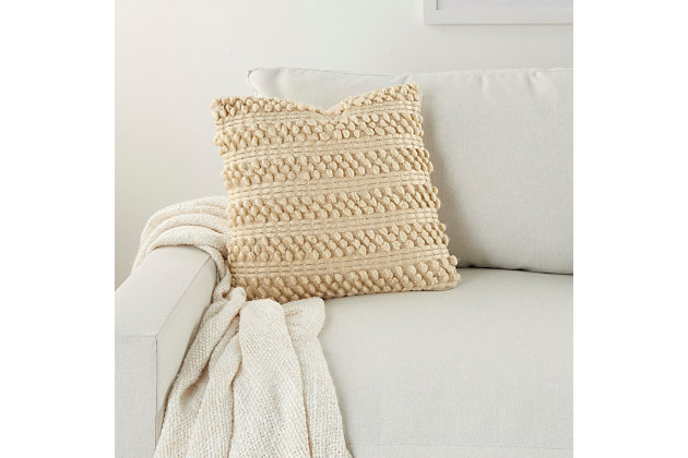 Comfortable and casual, this versatile throw pillow blends easily with just about any color scheme and room decor. The handcrafted polyester accent pillow looks good after continued use.Cover made of polyester | Polyester fill | Handcrafted | Zipper closure | Spot clean | Imported
