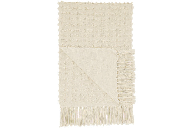 Comfortable and versatile, this throw blanket blends beautifully with just about any color scheme and room decor. The handcrafted cotton blanket feels soft and looks good after continued use.Made of cotton | Handcrafted | Spot clean | Imported