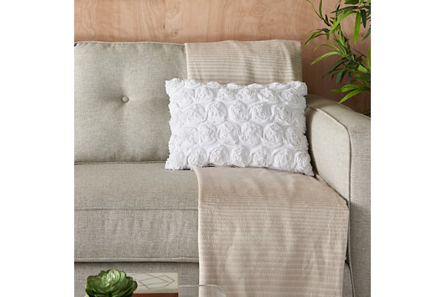 The subtle floral pattern in this throw pillow is a nice touch for a casual sitting area or a more formal setting. In a soft hue that blends beautifully with any color scheme, the handcrafted polyester and cotton accent pillow feels soft and looks good after continued use.Cover made of polyester/cotton | Polyester fill | Handcrafted | Spot clean | Imported