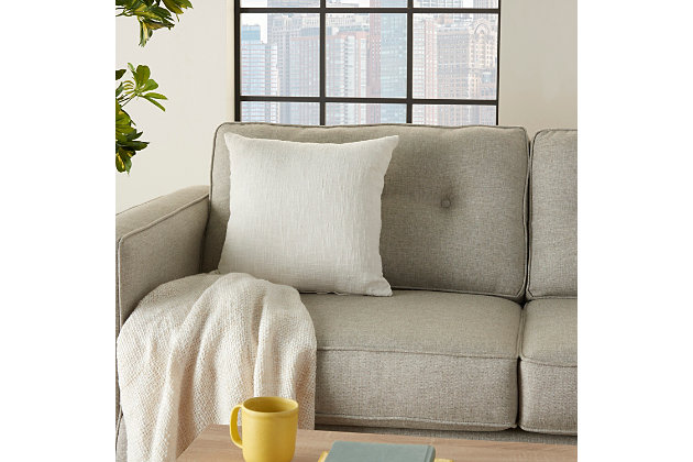 Take your casual decor up a notch with this solid throw pillow from Mina Victory Home Accents. Pure cotton, woven skillfully in white with nubby stitches, adds subtle texture to your couch, chair, or other seating area. Handmade 18” square includes polyester insert and zipper closure. Available in multiple coordinating sizes and colors.Handcrafted | Polyester fill | Handcrafted | Rectangle | Indoor only | Spot clean