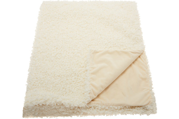 Indulge your taste for luxury with these magnificent faux fur pillows and throws, sure to introduce a warm, plush ambiance to any interior. Show your impeccable taste and make your seating area inviting in an instant with these artistic creations.Machine made | Indoor only | Spot clean | Ivory | 100% polyester | Throw blanket | Imported