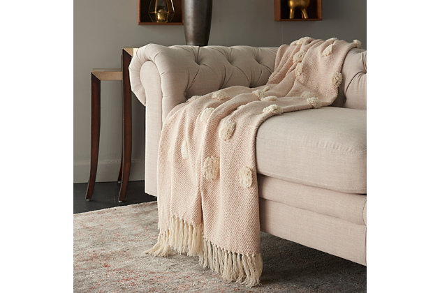 Our decorative throw blankets are a perfect layer for any couch, chair or bed. Luxurious to the touch, our throw blankets have a high-end design, look and feel. They are super soft, warm and extremely cozy. Each throw blanket is large enough to use as a blanket and stylish enough to use as an accent piece.Handcrafted | Indoor only | Spot clean | Blush | Cotton | Throw blanket | Imported