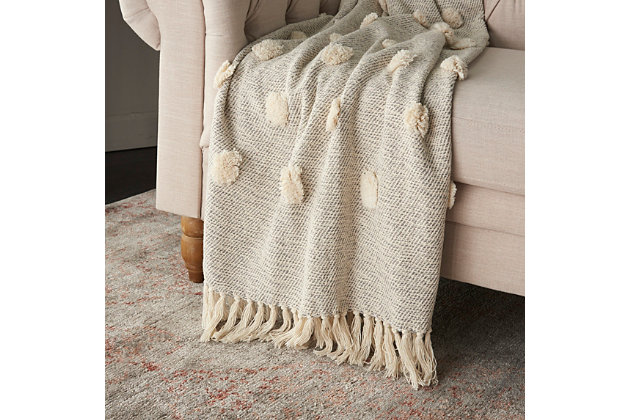 Our decorative throw blankets are a perfect layer for any couch, chair or bed. Luxurious to the touch, our throw blankets have a high-end design, look and feel. They are super soft, warm and extremely cozy. Each throw blanket is large enough to use as a blanket and stylish enough to use as an accent piece.Handcrafted | Indoor only | Spot clean | Gray | Cotton | Throw blanket | Imported
