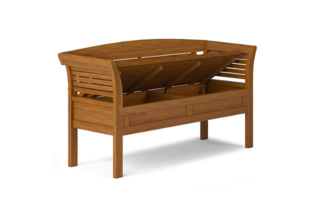 Let your inner designer shine through with this exceptional sculptural entryway bench. The Arlington Storage Bench, made from solid wood, was designed to make an powerful first impression. This stylish bench was designed to be functional as well as beautiful and comes with added storage and seating for your entryway or mudroom. The bench features a convenient flip up lid allowing for easy retrieval of articles from the dual storage compartment below.; Efforts are made to reproduce accurate colors, variations in color may occur due to computer monitor and photography; At Simpli Home we believe in creating excellent, high quality products made from the finest materials at an affordable price. Every one of our products come with a 1-year warranty and easy returns if you are not satisfiedDIMENSIONS: 18"D x 49" W x 27.4"H; Handcrafted with care using the finest quality solid wood | Hand-finished in Light Golden Brown and a protective NC lacquer to accentuate and highlight the grain and the uniqueness of each piece of furniture | Large, spacious entryway bench seats 2 comfortably; Assemby Required | Lift up bench lid opens using safety hinges to expose 2 large internal storage compartments; Contemporary style includes shaker square front panels and slatted arms and back