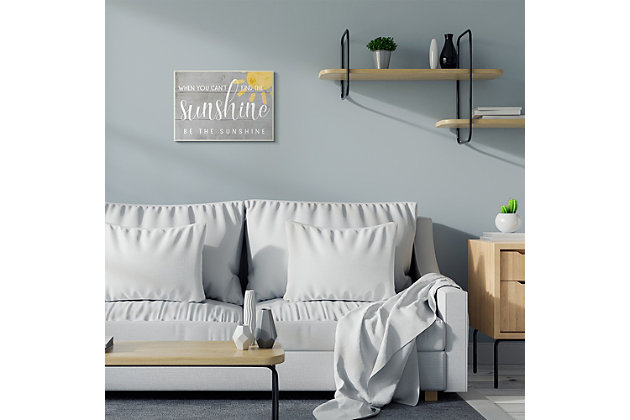 Gray shiplap provides the backdrop for a farmhouse ready sentiment: When you can't find the sunshine, be the sunshine. Proudly made in the USA, all of our wall plaques start off as high quality lithograph prints that are then mounted on durable MDF wood. Each piece is hand finished and comes with a fresh layer of foil on the sides to give it a crisp clean look. It arrives ready to hang with no installation required, and comes with sturdy clear corners to keep it from damaging in transit.Ready to hang | Proudly made in usa | Design by daphne polselli