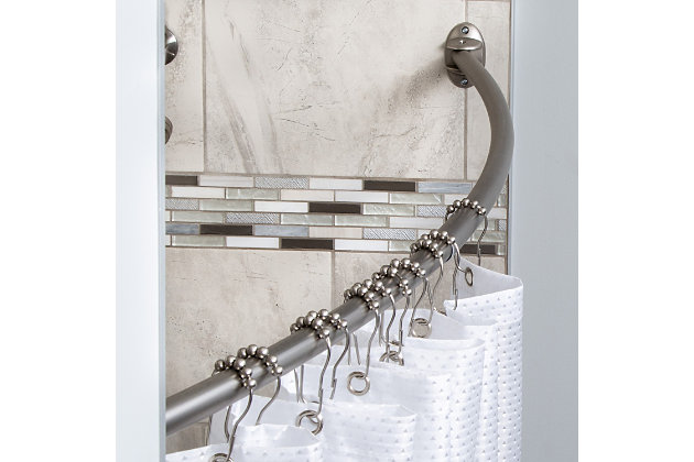 Your bathroom is yours, and you love it, but who can’t use a bit more space in the shower? When this adjustable curved shower curtain rod shows up, not only will it add a different look to your bathroom but you’ll have that extra space that makes your shower feel a lot roomier. Might even allow you to add some dance moves to your singing-in-the-shower routine.Adjustable from 42” to 74” | Curved rod provides additional space vs. Traditional shower curtain rod | Durable metal material | Nickel finish adds to its modern style