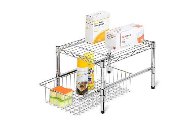 A flexible storage solution that adjusts in height to accommodate tall or shorter items in most cabinets. Also good for pantry organization, the contemporary design and brilliant chrome finish present a polished look when you open your cabinets. Handy and sizable, the wire basket pulls out for easy access to anything from food items to under-the-sink cleaning supplies. This shelf works best in cabinets that are 18 inches wide or larger.A flexible storage solution that adjusts in height to accommodate tall or shorter items in most cabinets. Also good for pantry organization, the contemporary design and brilliant chrome finish present a polished look when you open your cabinets. Handy and sizable, the wire basket pulls out for easy access to anything from food items to under-the-sink cleaning supplies. This shelf works best in cabinets that are 18 inches wide or larger. | Basket provides catch-all for smaller items | Sturdy construction for durability | Dimensions: 15”l x 17.5”w x 10.5”h