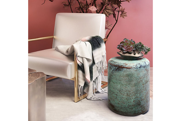 Create a stylish yet cozy new look with the Afrino throw. Luxuriously soft, it features muted colors and tasseled sides. Drape it over your shoulders for added warmth, or on your favorite furniture for a touch of color in any space.Made of acrylic/polyester/wool | Soft texture | Tassel details | Imported