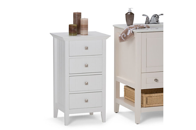 It's almost impossible to find a bathroom that can't use additional storage with all the beauty products and toiletries out there. Featuring a Pure White finish and slim profile, the Acadian 4 Drawer Floor Cabinet will fit easily into a variety of bathroom designs. The unit features four drawers, allowing you plenty of storage for items you want to keep handy but out of sight. Efforts are made to reproduce accurate colors, variations in color may occur due to computer monitor and  photography. At Simpli Home we believe in creating excellent, high quality products made from the finest materials at an affordable price.DIMENSIONS: 18"w x 15.75" d x 32" H | Constructed using Rubberwood and Engineered Wood | Durable Pure White painted finish sealed with a premium NC lacquer coating | Features four (4) drawers with Brushed Nickel hardware finish | Grooved detail on side panels, Solid Rubber wood frame and legs | Contemporary styling ,Anti- tip hardware included | Assembly required | We believe in creating excellent, high quality products made from the finest materials at an affordable price. Every one of our products come with a 1-year warranty and easy returns if you are not satisfied.