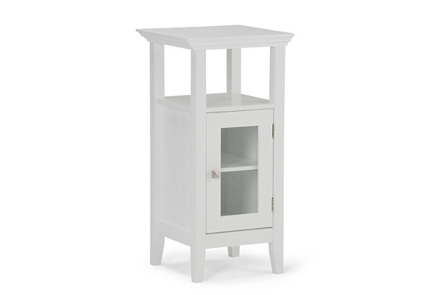 Organize the clutter and take back your bathroom space with the Acadian Bath Storage Floor Cabinet. With classic details and a crisp Pure White finish, this storage cabinet will easily coordinate with existing decor and add a fresh look to your space. Featuring both open and enclosed storage space with tempered glass and brushed nickel hardware, it's an attractive way to keep extra towels and toiletries on hand. Efforts are made to reproduce accurate colors, variations in color may occur due to computer monitor and  photography. At Simpli Home we believe in creating excellent, high quality products made from the finest materials at an affordable price.DIMENSIONS: 15"W x 14" D x 30" H | Constructed using Rubberwood, Engineered Wood and Tempered Glass | Durable Pure White painted finish sealed with a premium NC lacquer coating | Features one (1) door with one (1) adjustable interior shelf. Brushed nickel hardware | Grooved detail on side panels, Solid Rubber wood frame and legs | Contemporary styling ,Anti- tip hardware included | Assembly required | We believe in creating excellent, high quality products made from the finest materials at an affordable price. Every one of our products come with a 1-year warranty and easy returns if you are not satisfied.