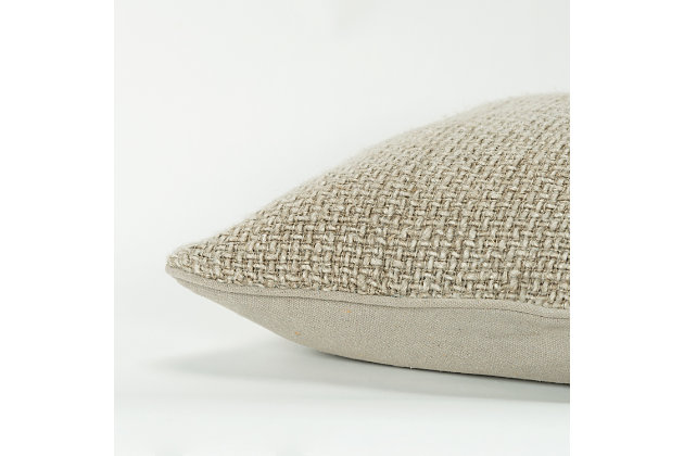This pillow is part of the Donny Osmond Home Collection. Texture, soft texture, beautifully appointed texture, sophisticated texture!  How many ways can we describe this beautifully skin-friendly blending of linen and soft, soft, soft cotton yarning to create a divinely textured pillow that is classic in its appeal and timeless in its divinity. This pillow features a solid coordinating cotton canvas back. Please note that given the chunky nature of these soft yarns, should the end of one “sprout”, it should NOT be considered a flaw. It will simply be where one yarn stopped and another began in the weaving process. Simply clip closely with a scissor and it will be restored promptly to perfection. The simplicity of the weave with the best of natural fibers give this pillow an organic artistry unsurpassed.Linen | Solid woven linen | Soft textural weave | Solid coordinating back | Dry clean only | Brown | Polyfill | Imported
