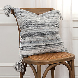 Knife edged, this pillow features woven patterning that works as a solid in your indoor or covered outdoor living space. Four corner tassels add charm and whimsey to this contemporary styling. Shades of neutrals allow this pillow to work beautifully with many sling or woven patterned outdoor or indoor upholstered sofa groups. This pillow features a hidden back zipper closure for ease of fill. Suitable for outdoor use.Polyester | Indoor or covered outdoor use | Water resistant | Solid coordinating back | Machine wash cold, gentle cycle,  tumble dry low, do not bleach | Gray | Polyfill | Imported