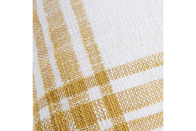 This woven pillow is textural and simplistically artisanal. Woven of white and yarn dyed colored yarns, this pillow has both a physical and visual texture. The color woven in gives this pillow a heathered appearance through most of the linear woven elements. at the intersection of the vertical and horizontal lines, the color is solid. A flange that evolves from the literal weaving gives this pillow the handcrafted touch its construction celebrates. This pillow features a solid cotton back with a hidden zipper closure. Cotton | Textured cotton slub base | Yarn dyed woven accent | Self fringed | Machine wash cold, gentle cycle,  tumble dry low, do not bleach | Gold | Polyfill | Imported