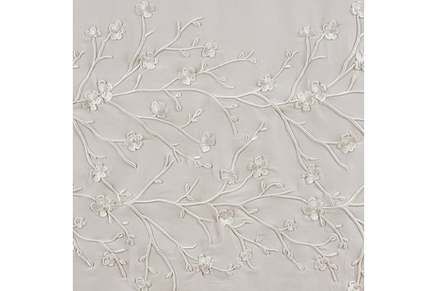 Add a timeless look to your bedroom decor with this set of window panels. The sophisticated panels are beautifully made with design house-quality fabric and craftsmanship, and feature a unique raised three-dimensional embroidered floral design in soft gray and white hues. They include tiebacks to create an open, airy look, and are lined to keep your room comfortable throughout the day. They feature three-inch headers and rod pockets for easy setup.Sold as a pair (2 window panels) | Made of 100% cotton | 3-inch rod pocket allows for easy setup | Fully lined | 2 coordinating tiebacks included | Machine washable | Matching valance available (sold separately) | Imported