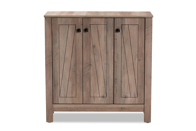 Update your entryway with the fantastic Derek shoe cabinet. This cabinet is made from sturdy engineered wood showcasing a natural oak finish. Ten internal shelves provide room to place up to 15 pairs of shoes, depending on size. The cabinet's doors feature an exquisitely carved design, as well as black square metal knobs for added visual appeal.Made of metal and engineered wood | Natural oak finish | Ten shelves | Carved wood doors | Assembly required