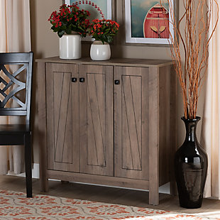 Update your entryway with the fantastic Derek shoe cabinet. This cabinet is made from sturdy engineered wood showcasing a natural oak finish. Ten internal shelves provide room to place up to 15 pairs of shoes, depending on size. The cabinet's doors feature an exquisitely carved design, as well as black square metal knobs for added visual appeal.Made of metal and engineered wood | Natural oak finish | Ten shelves | Carved wood doors | Assembly required
